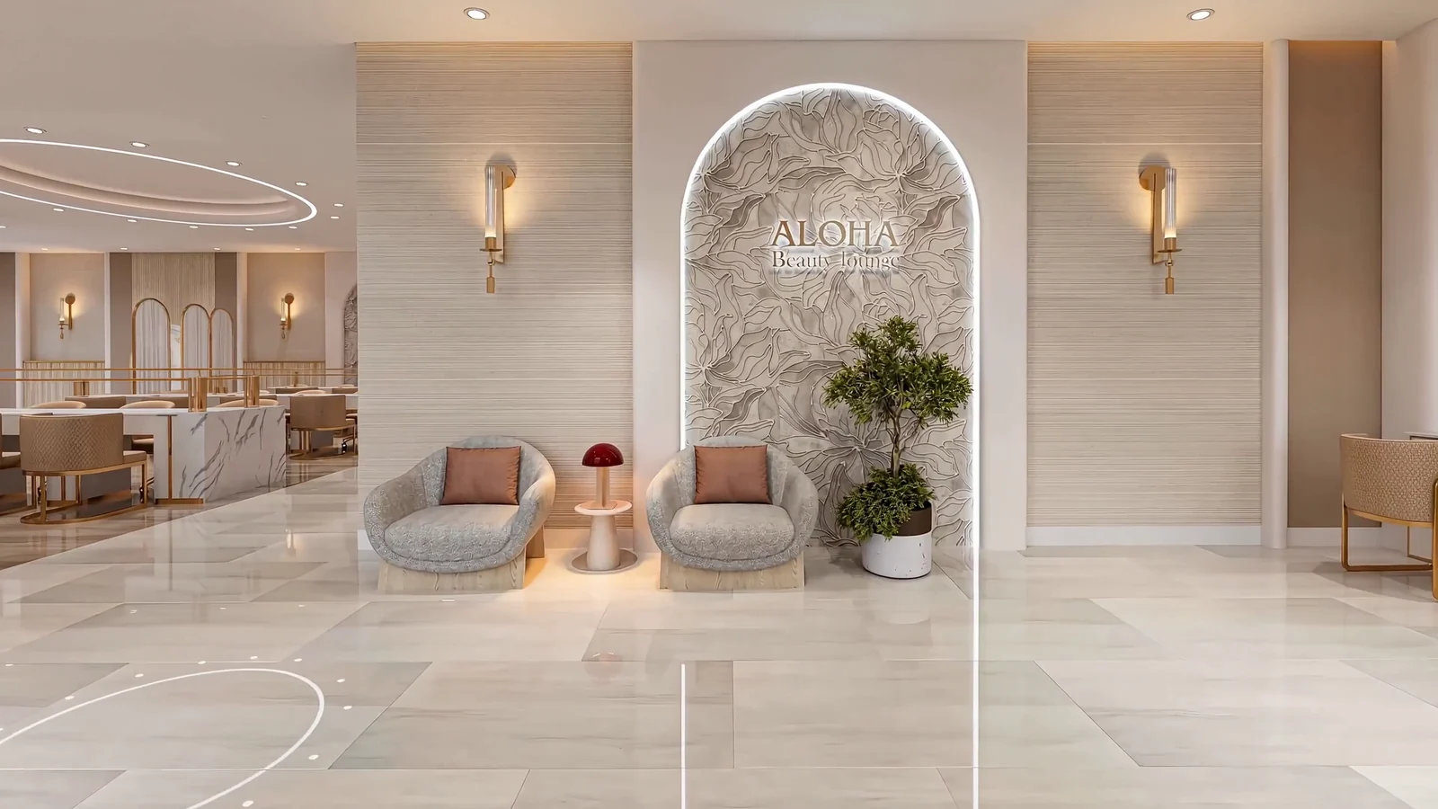 The guest lounge at Aloha Beauty Lounge in South Jordan, with soft armchairs beside the carved Aloha feature wall
